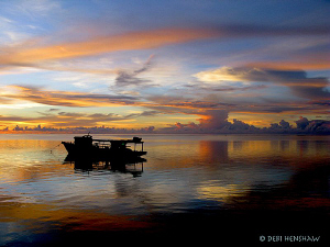 "At the End of the Day" Sunset across Bunaken taken with ... by Debi Henshaw 